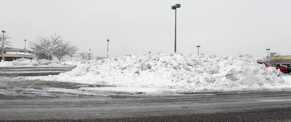 Pile of snow cleared from a parking lot in Louisville, KY.