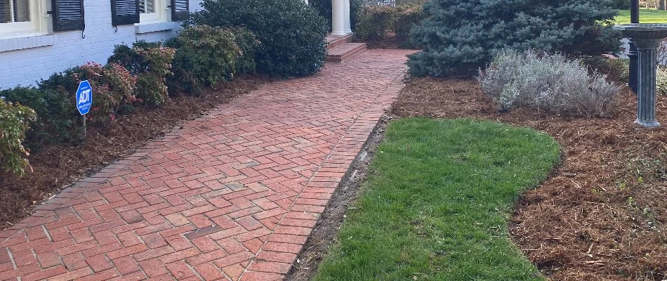 Brick walkway leading up to a house in Louisville, KY.