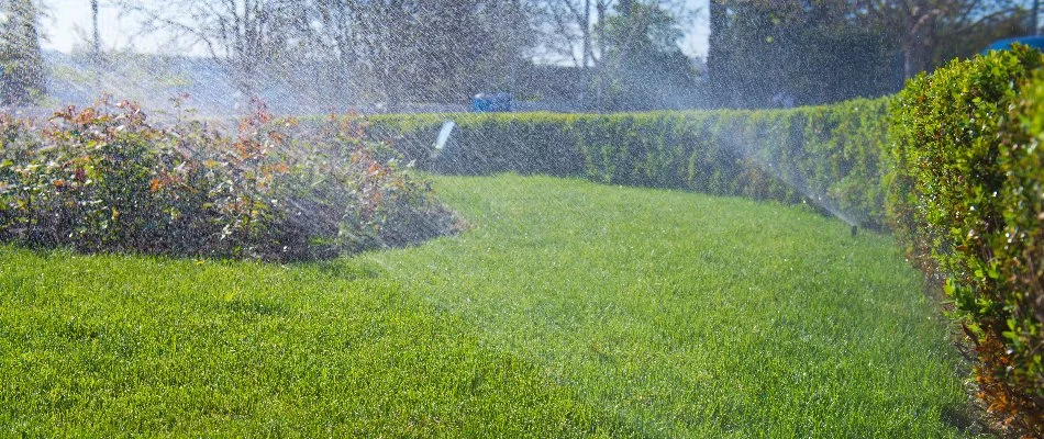 Sprinkler system watering lawn on property in Northfield, KY.