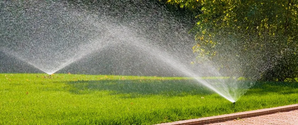 Lawn in Barbourmeade, KY, with irrigation sprinkler heads.