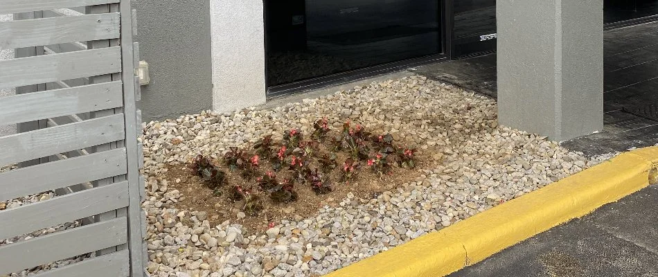 Rocks by entrance of commercial property in Louisville, KY.