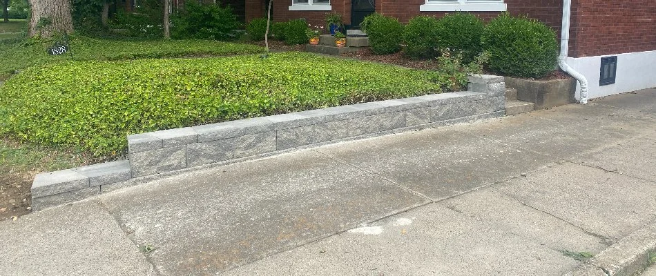 Small retaining wall along a driveway in Louisville, KY.