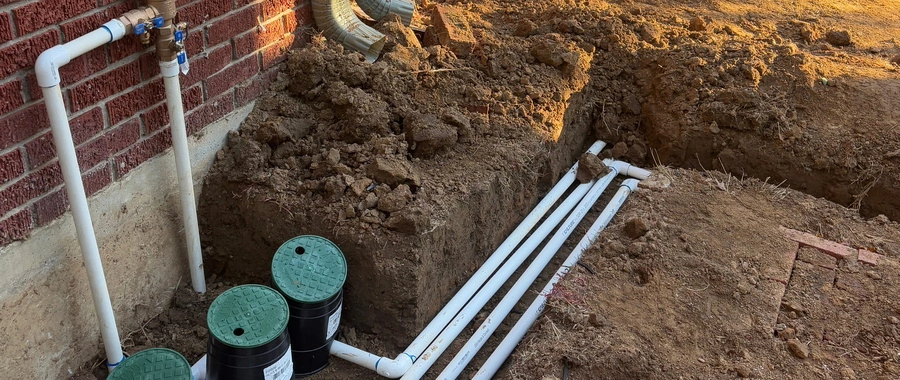 Sprinkler head on a lawn in Louisville, KY.